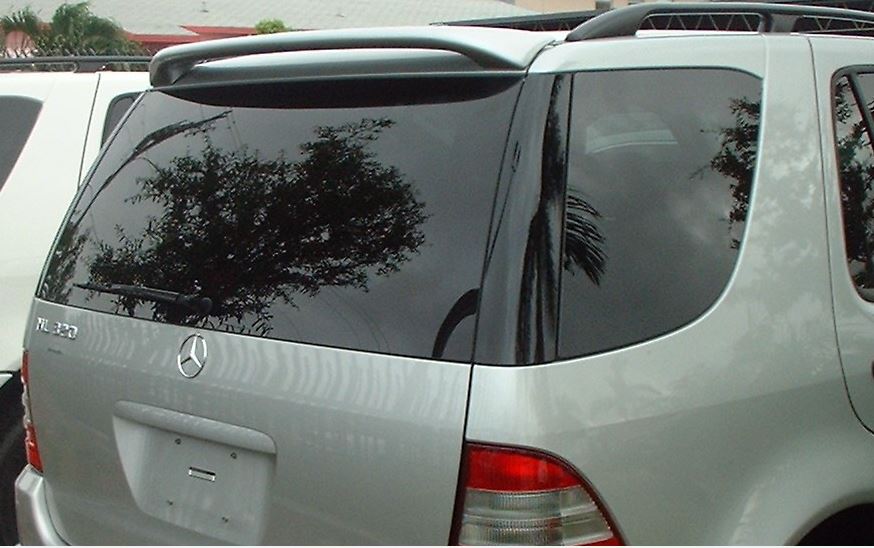 Spoiler above the rear glass